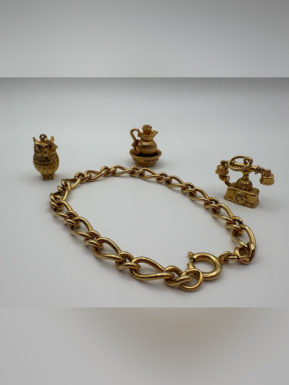 Vintage Avon Gold Tone Bracelet, 3 charms